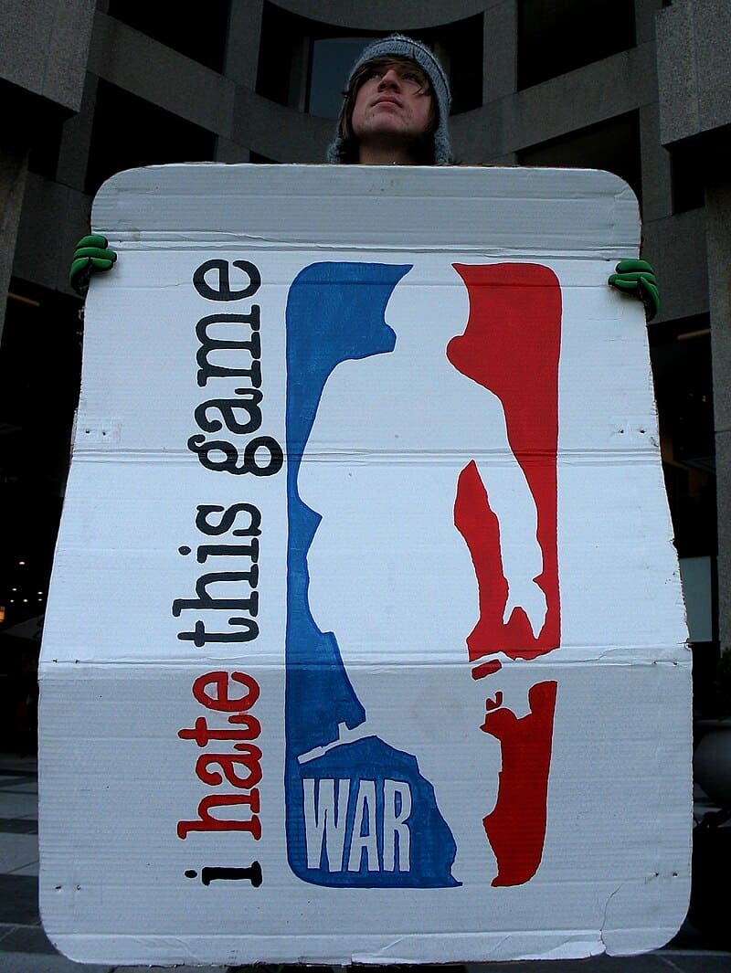 War protest sign parody NBA logo